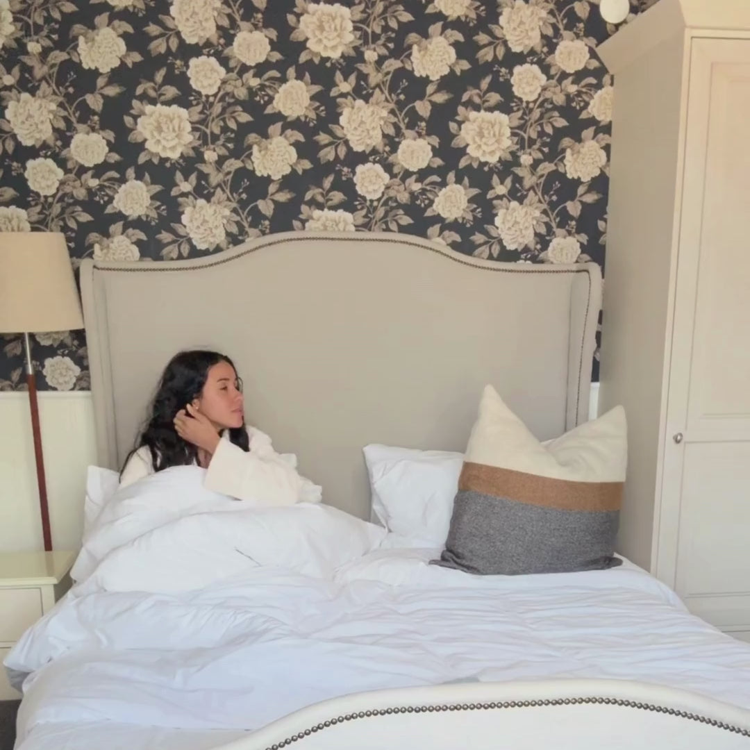 Video of a woman trying on our period panties in front of a mirror, showing how they fit and how comfortable they feel.